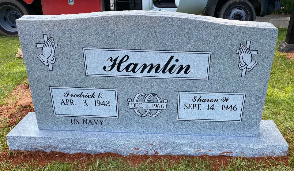 A grey granite companion upright with two name panels