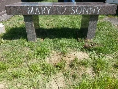Gray granite memorial bench engraved Mary and Sonny