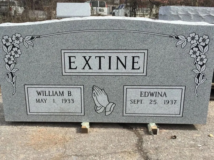 Gray granite companion upright with praying hands, Extine